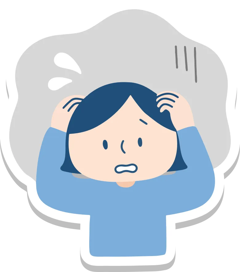 頭を抱えて悩む女性