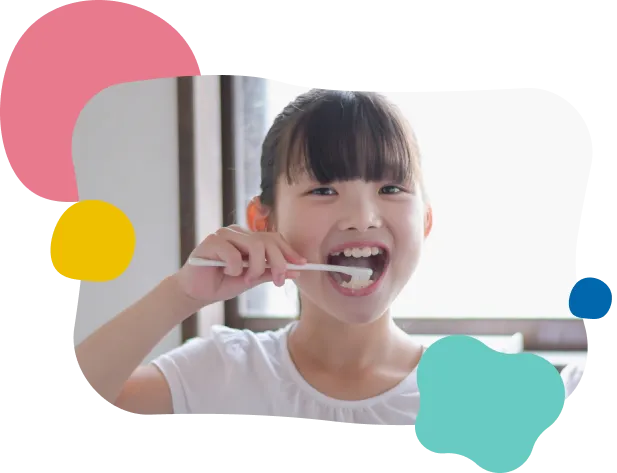 歯みがきをする女の子